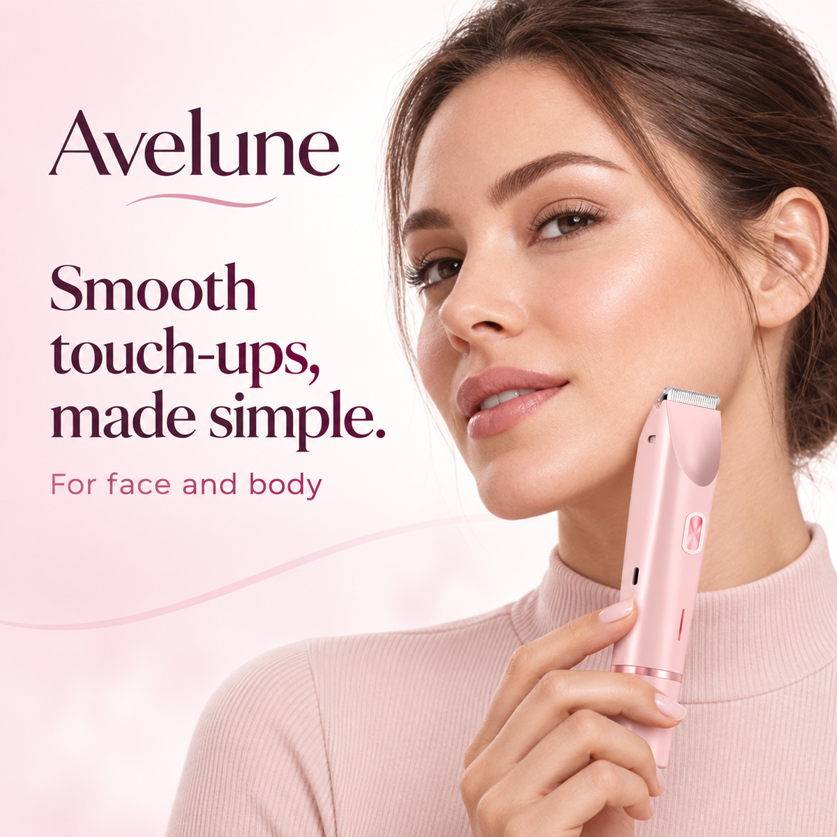 A woman holding the shaver beside her face